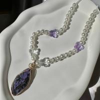 Handmade charoite beaded butterfly necklace