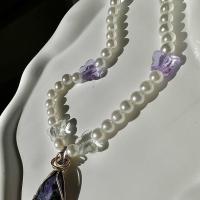 Handmade charoite beaded butterfly necklace